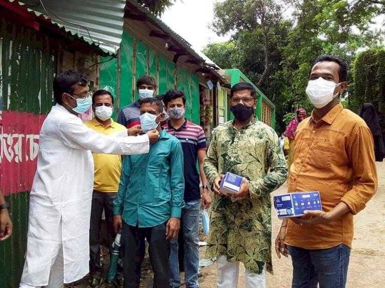 ধর্মপাশায় স্বেচ্ছাসেবক লীগের মাস্ক বিতরণ